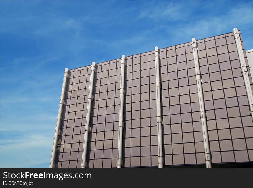 Office building blue sky background. Office building blue sky background