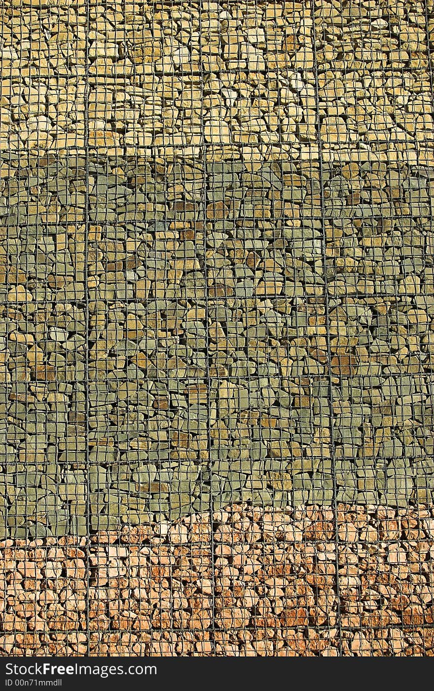 Thre coloured brick wall abstract, yellow green and red