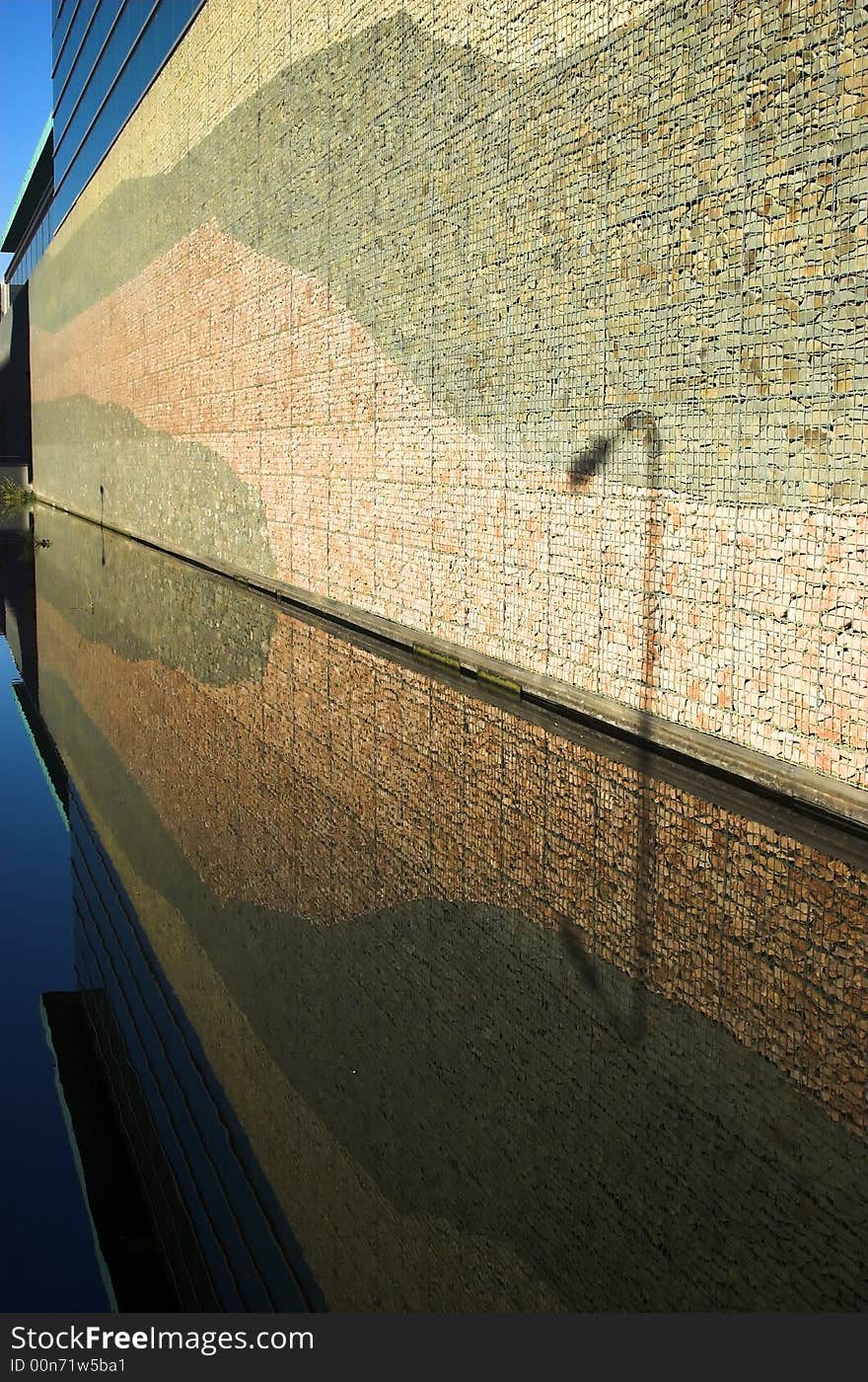 Thre coloured brick wall abstract, yellow green and red