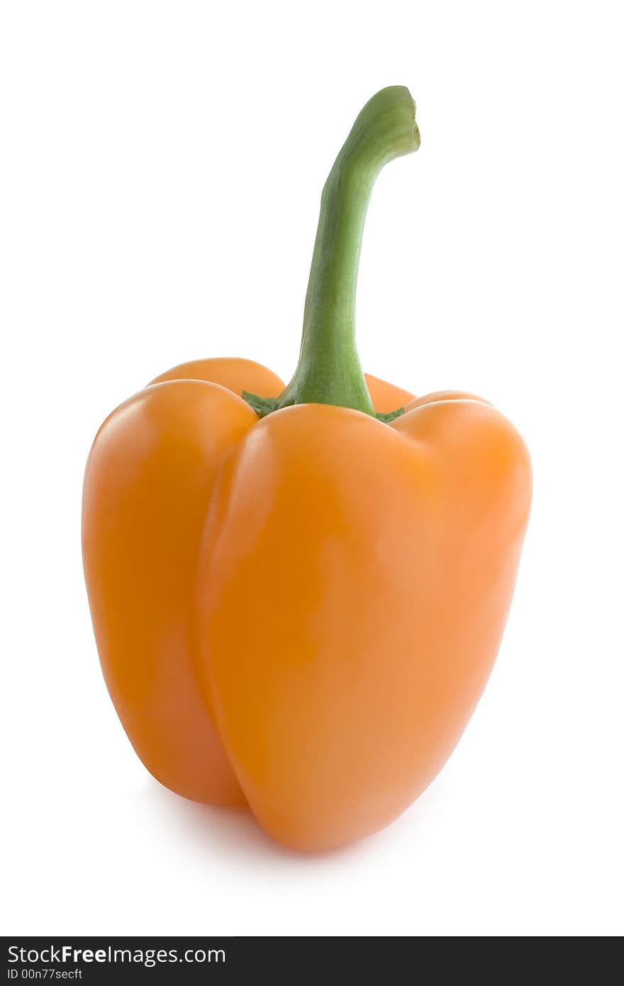 Isolated Orange Bell Pepper: Straight Product shot taken in Studio in Natural Light isolated against White Background