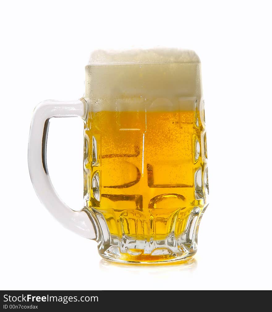 Fresh golden beer in a mug on a white background