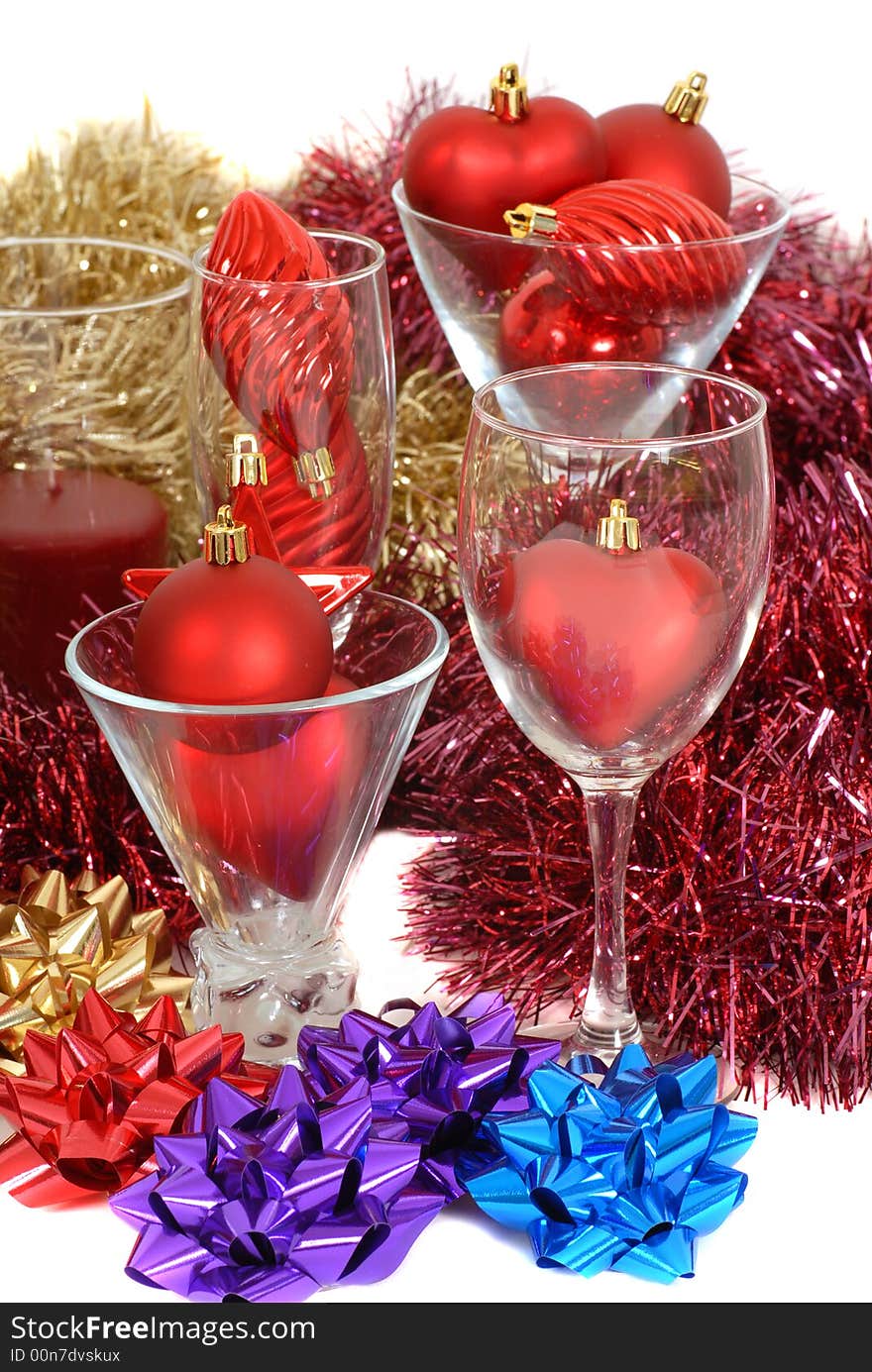 Christmas ornaments and decorations in and around glassware