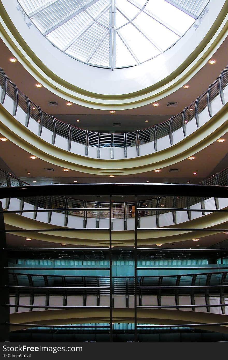 Interior view of modern building with elliptical shaped skylight as roof