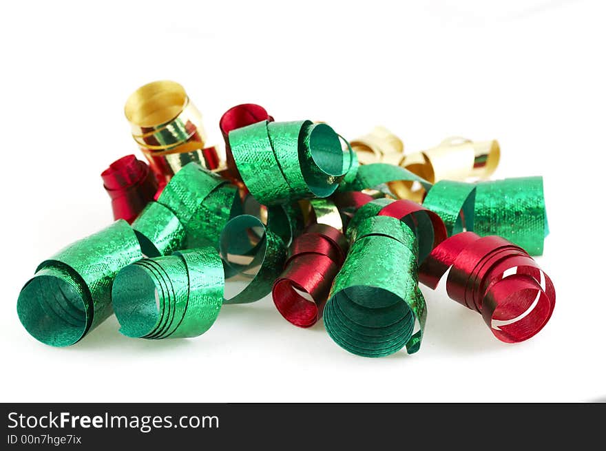 Green, red, and gold present ribbon on white. Green, red, and gold present ribbon on white