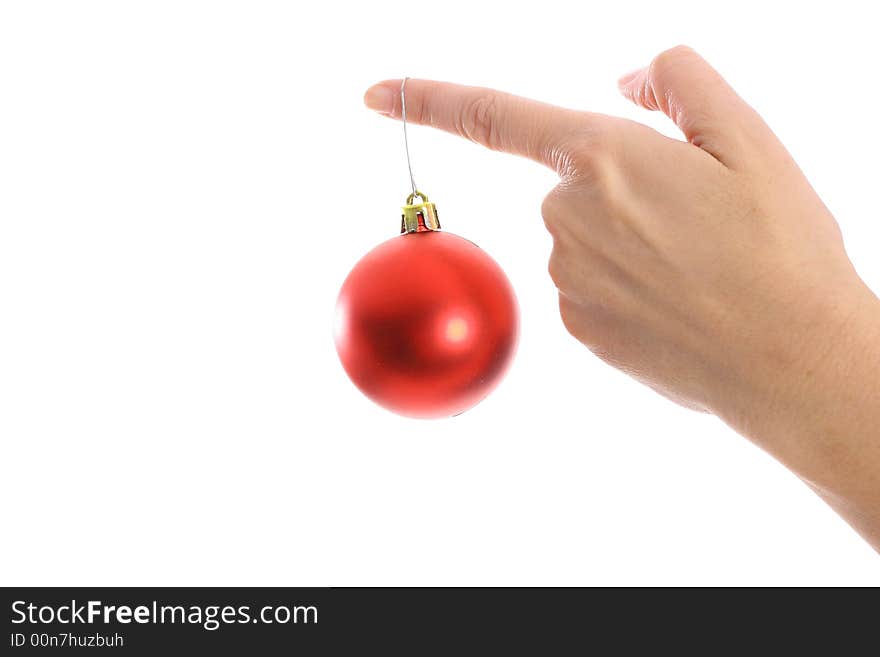 Ornament hanging on woman s finger