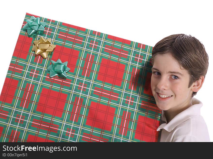 Young boy holding BIG present