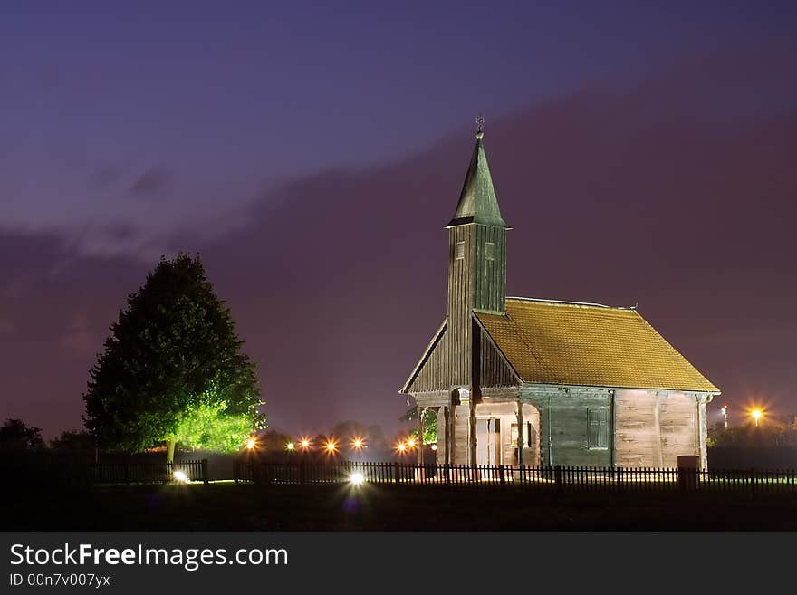 Church and tree at night with lights