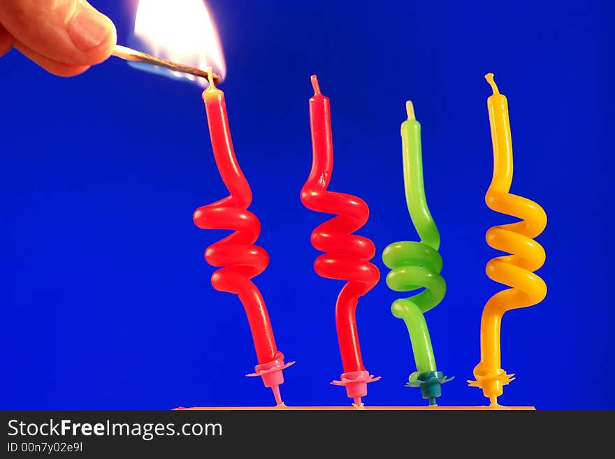 Candle on a dark blue background