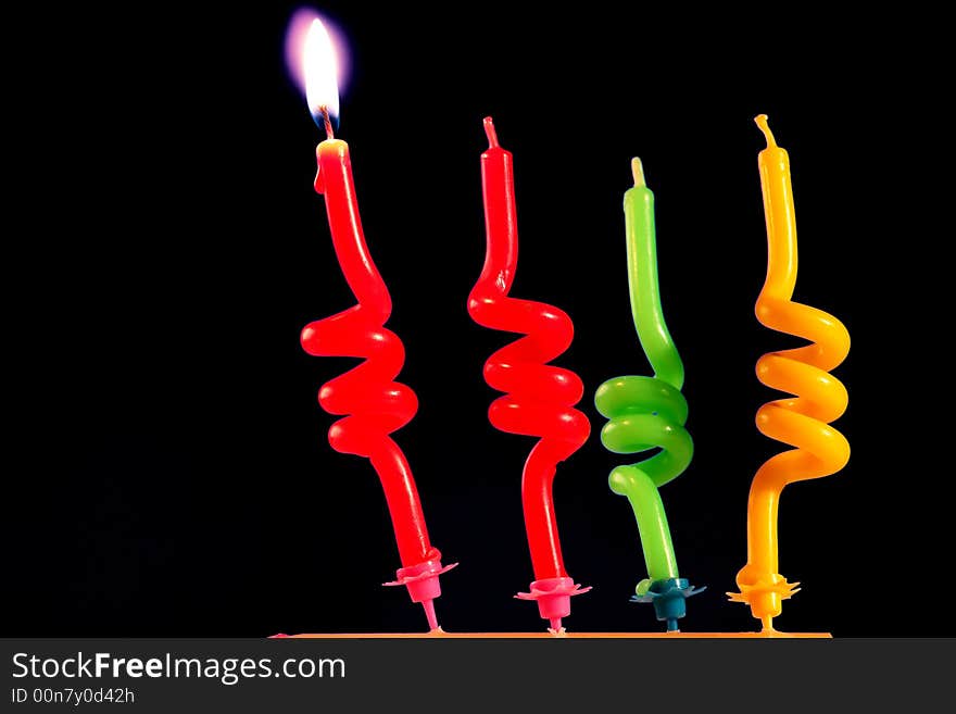 Candle on a black background