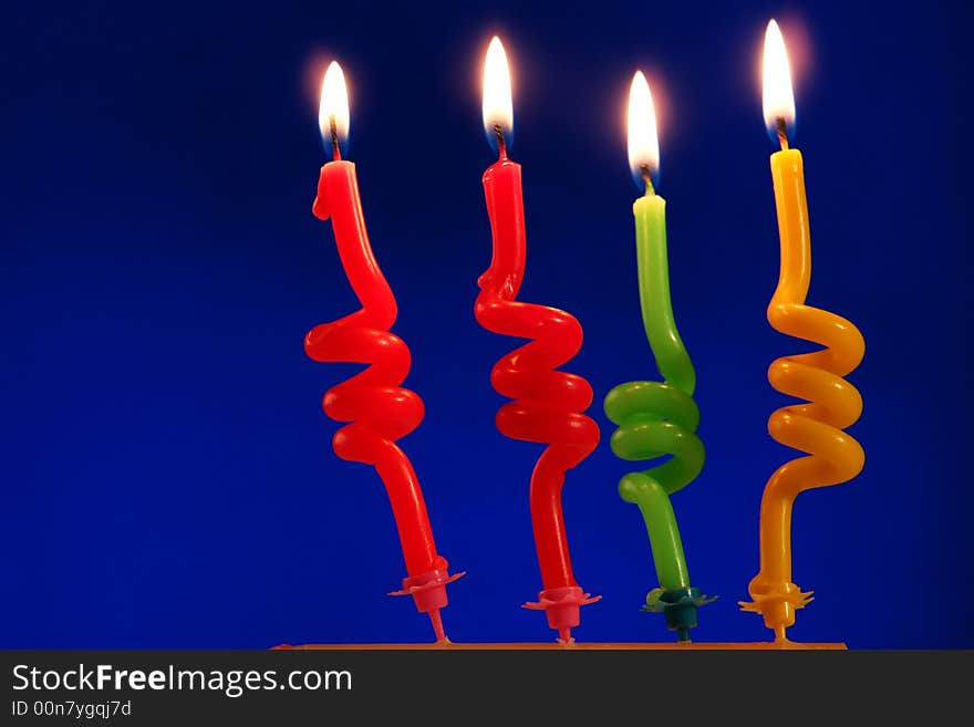 Candle on a dark blue background