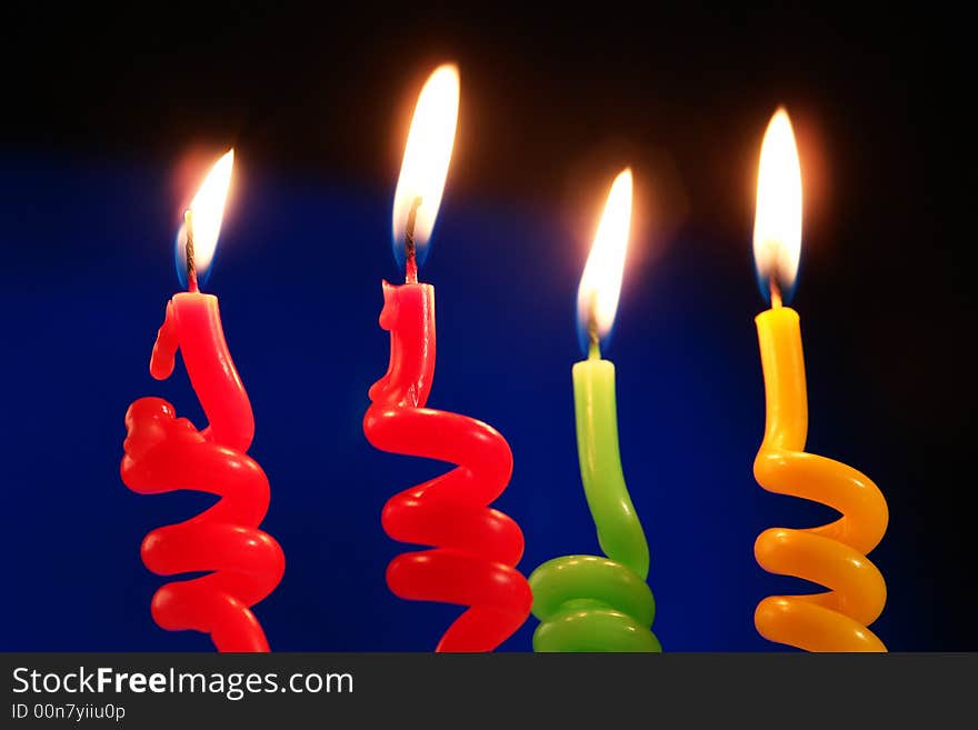 Candle on a dark blue background