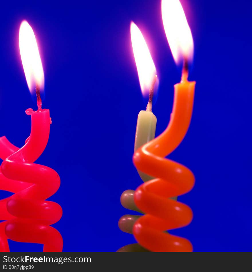 Candle on a dark blue background