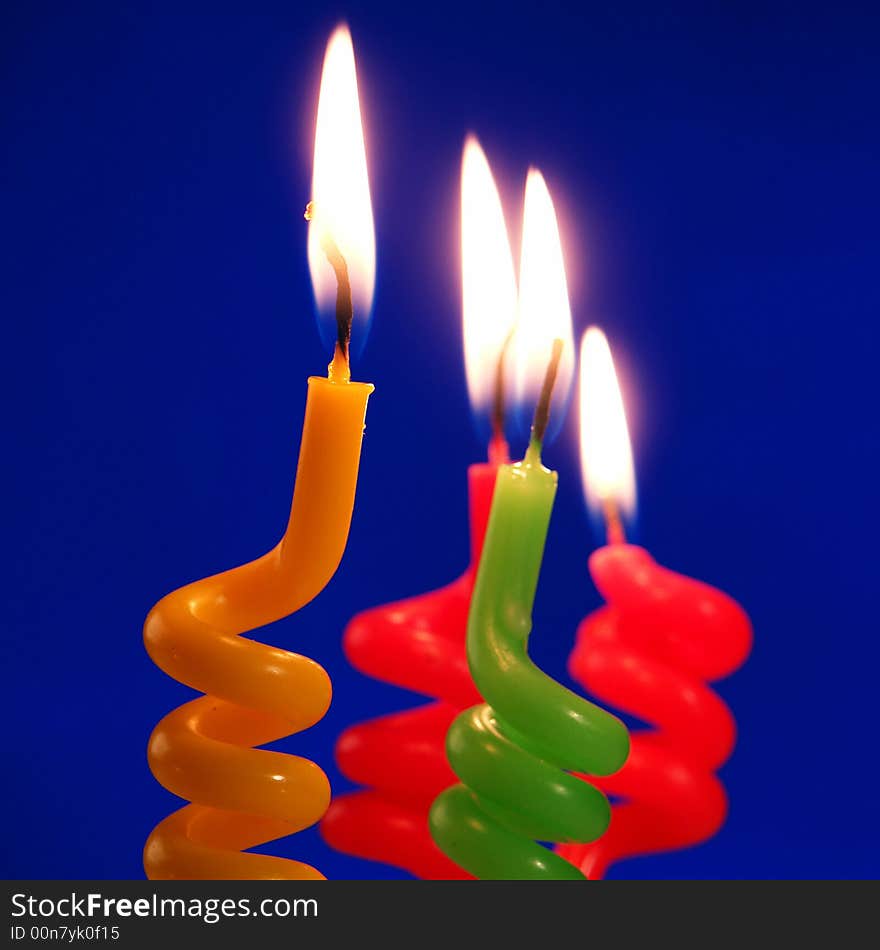 Candle on a dark blue background