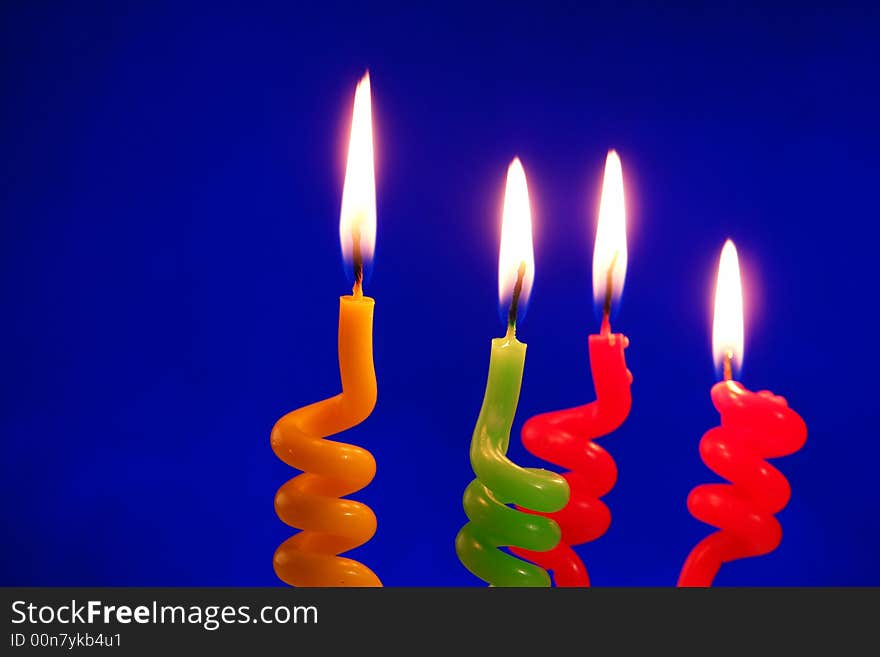 Candle on a dark blue background