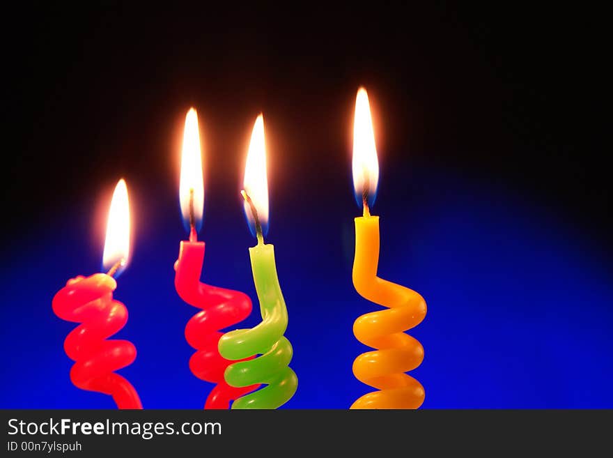 Candle on a dark blue background