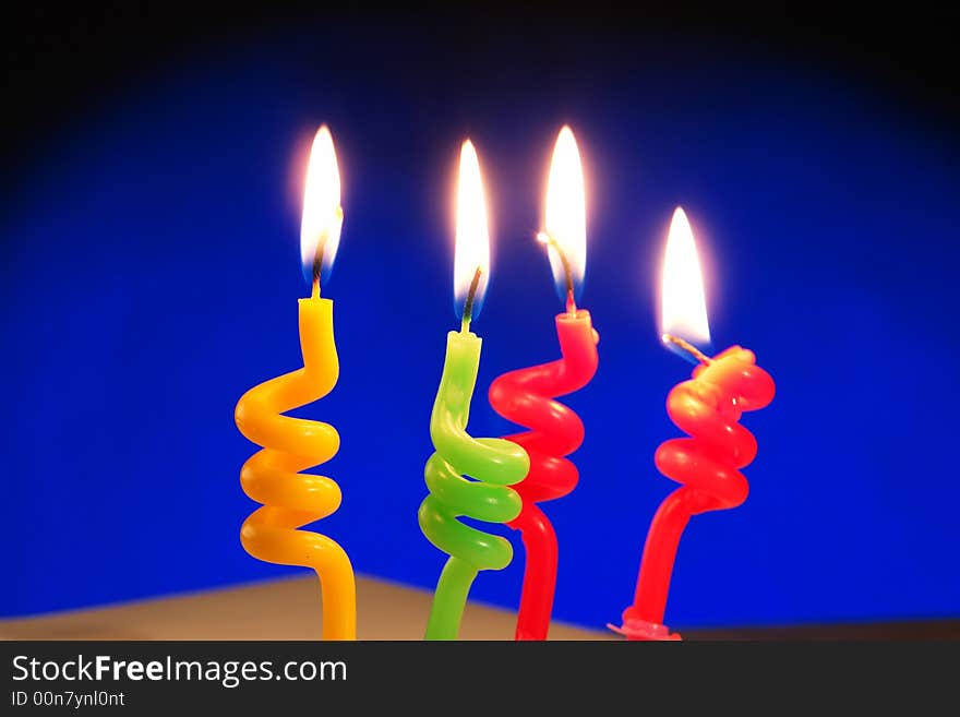 Candle on a dark blue background