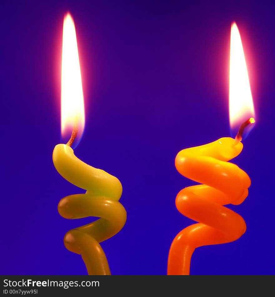 Candle on a dark blue background