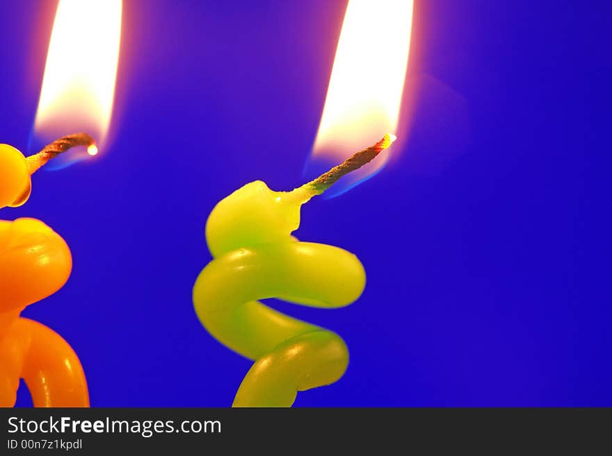 Candle on a dark blue background