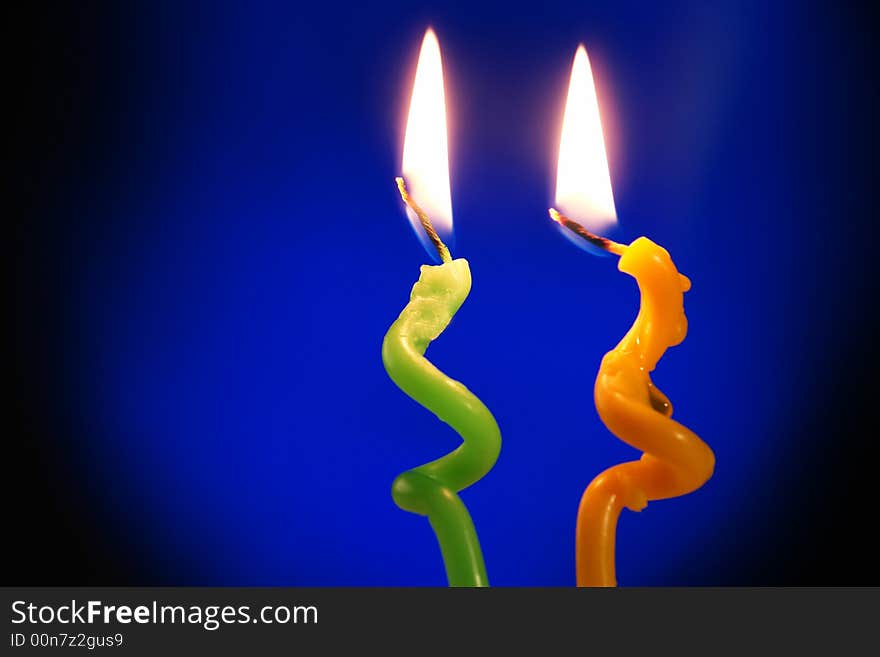 Candle on a dark blue background