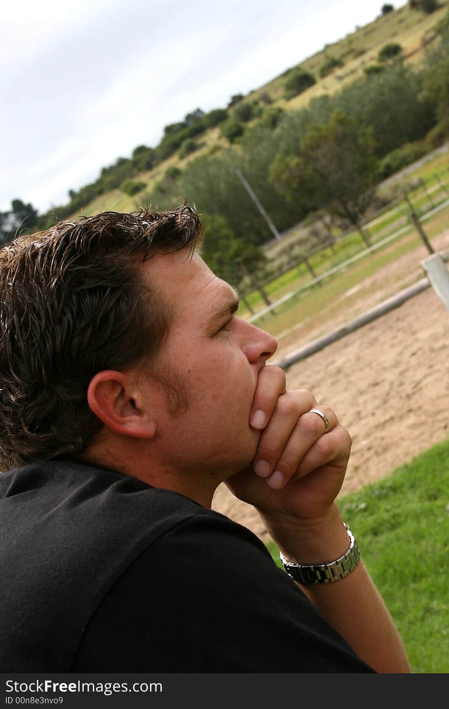 Profile of a young male looking into the distance