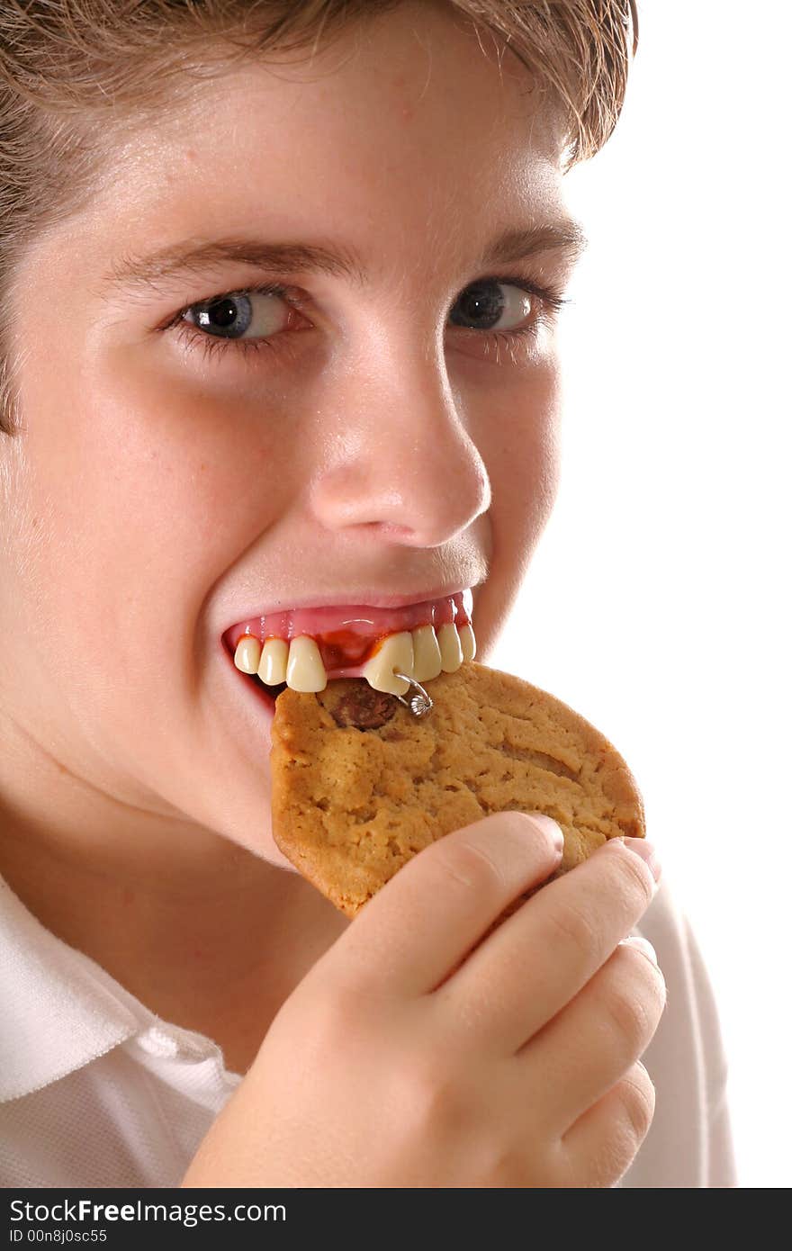 Shot of a Rotten teeth cookie boy