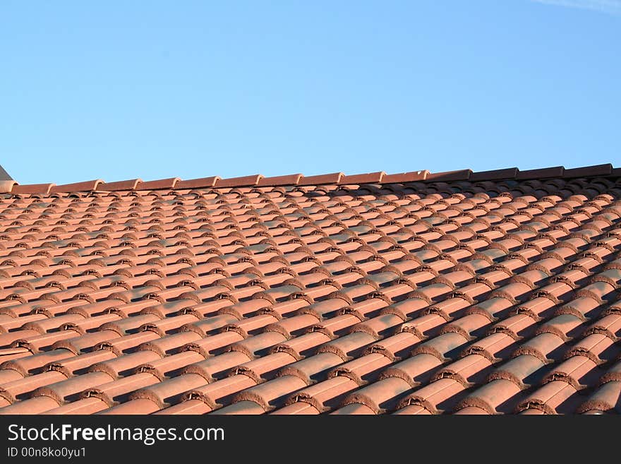 A classic red roof in the sky