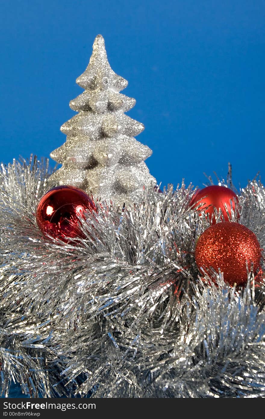 Silver christmas with tree and red globes