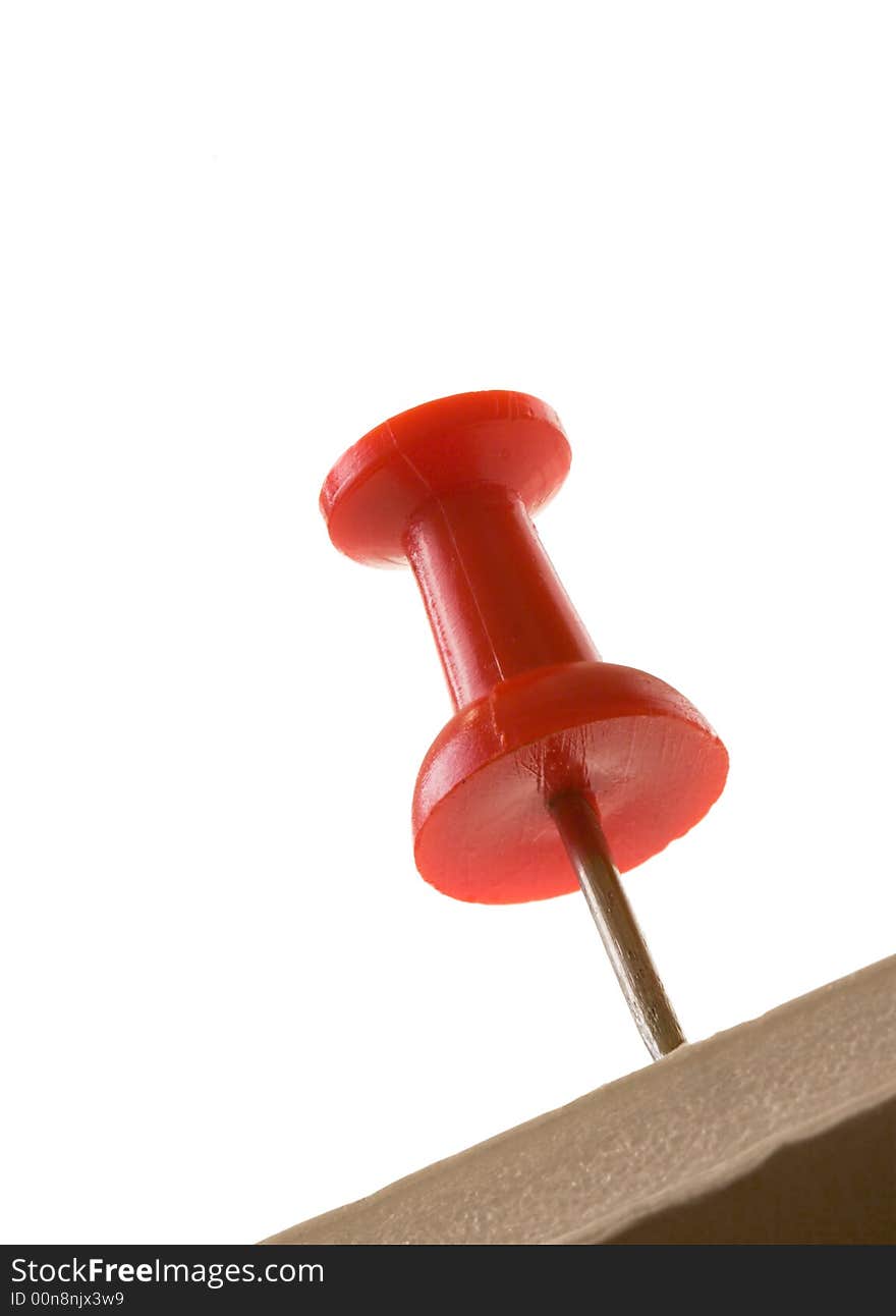 Low-angle view on a red pin. Low-angle view on a red pin.