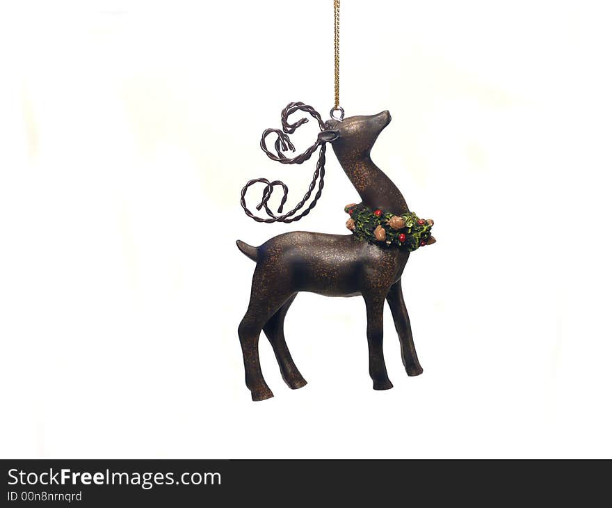 Christmas reindeer ornament hanging in isolated white background