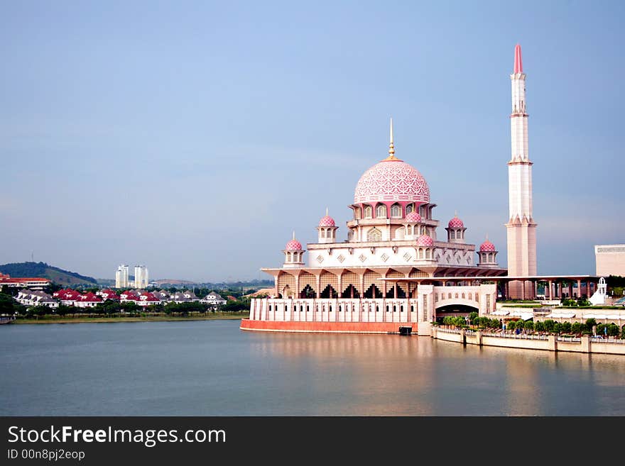 Red Floating Mosque on lake