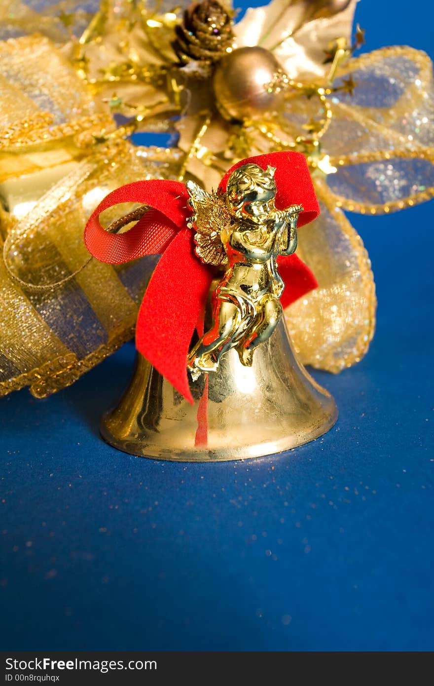 Golden christmas bell on blue background. Golden christmas bell on blue background