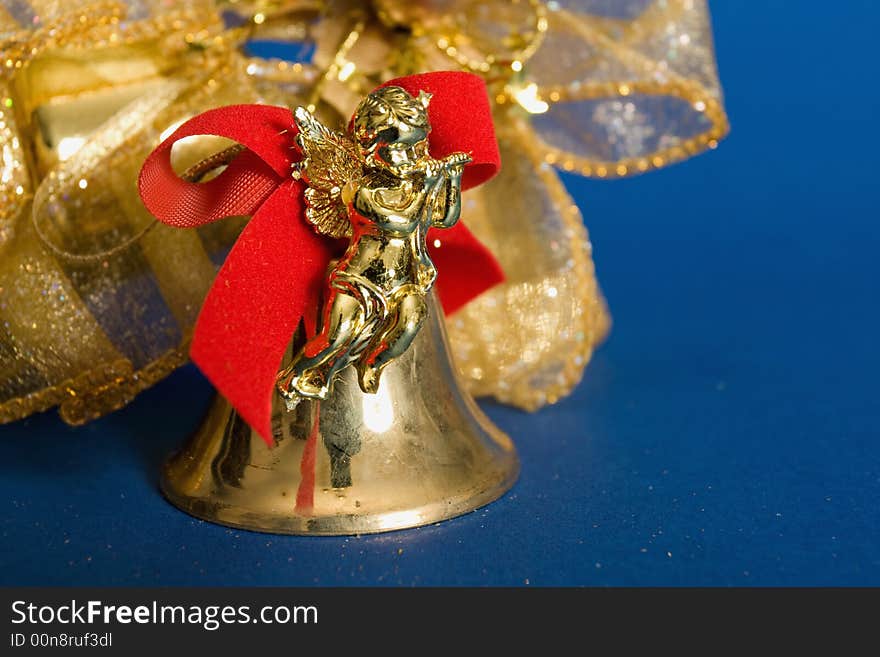 Golden bell with singing angel christmas decoration. Golden bell with singing angel christmas decoration