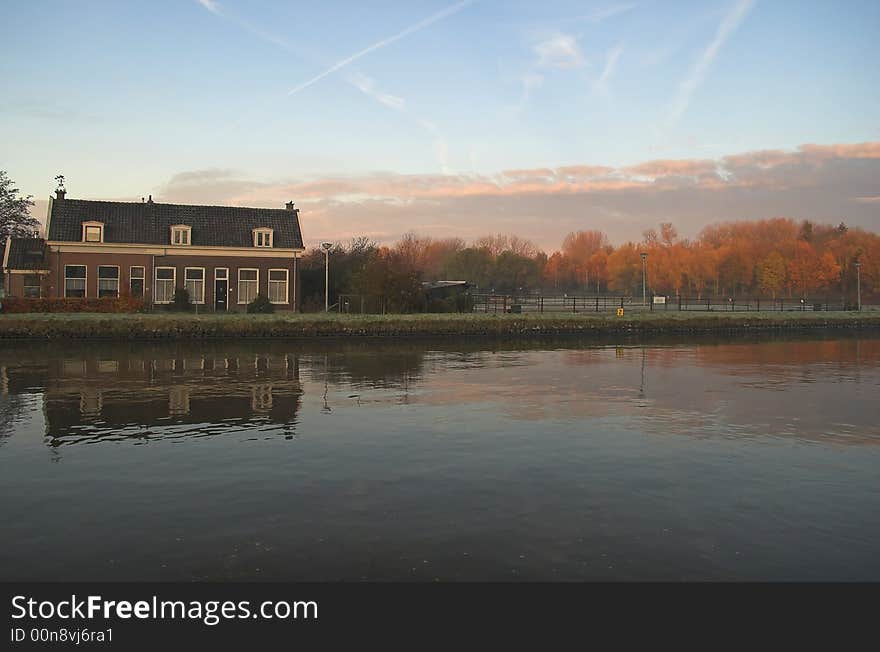 Canal road in Delft, Holland, photographed on a winter frosty morning in autumn