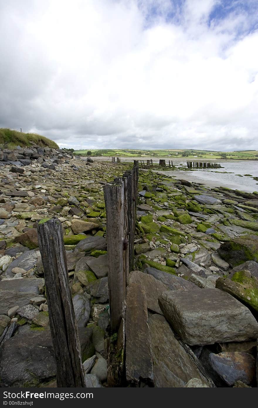 Close up of wooden fence along a beach. Close up of wooden fence along a beach