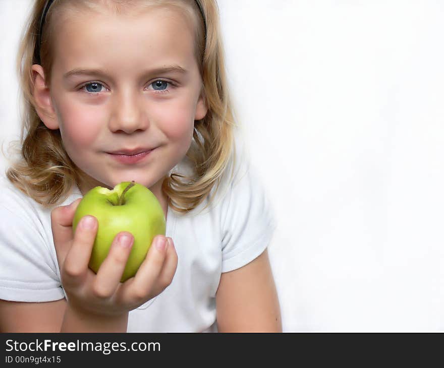 Adorable boy with apple