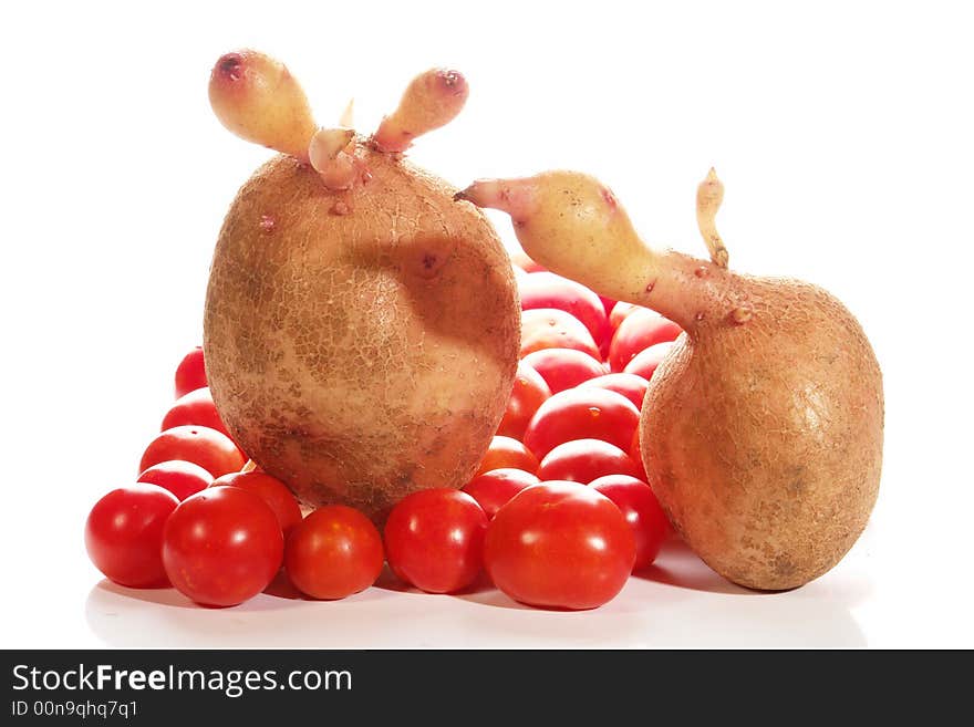 Potato, tomato on a white background