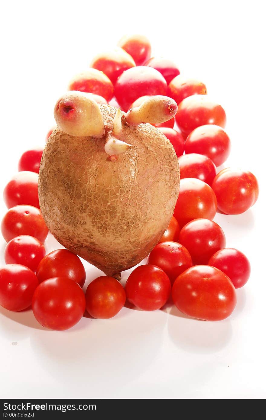 Potato, tomato on a white background