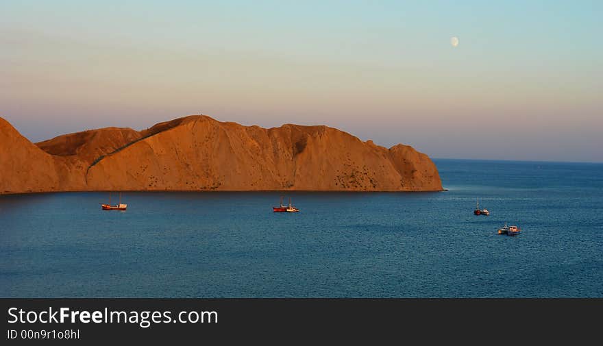 Boat on a background of mountains