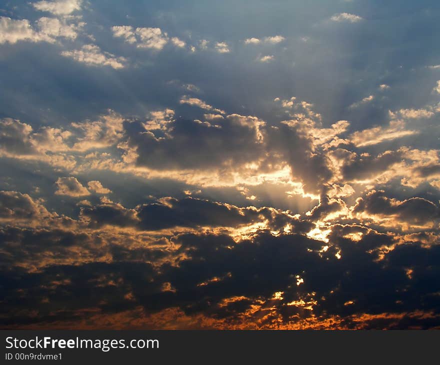 Sun rays in goldy clouds. Sun rays in goldy clouds