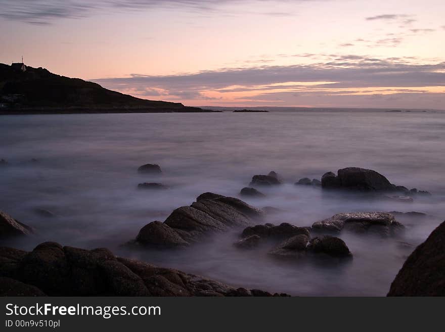 Sea shore at evening in Normandy with grey filter. Sea shore at evening in Normandy with grey filter