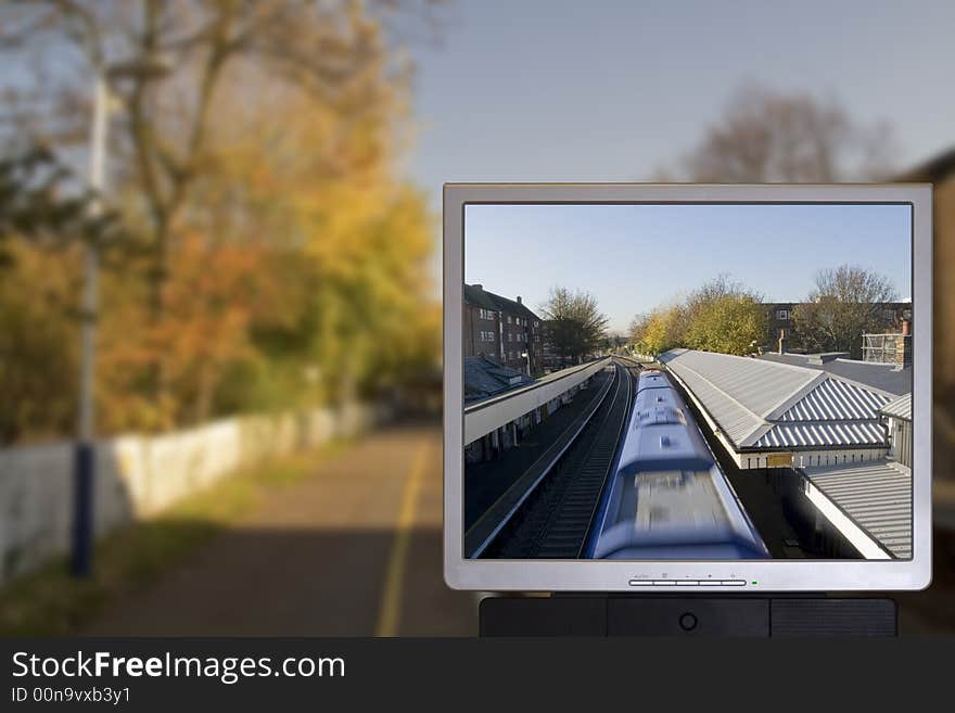 Image of train in station on pc monitor