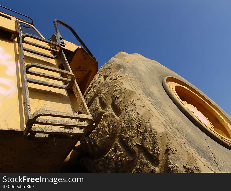 Stairs upward at a caterpillar machine. Stairs upward at a caterpillar machine.