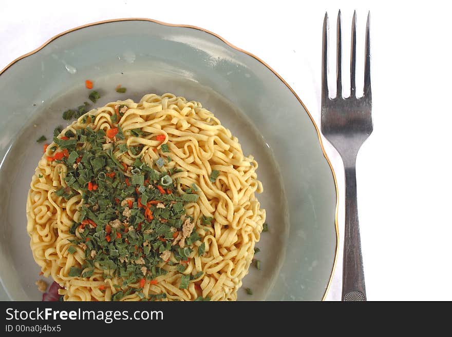 Noodles on plate with fork