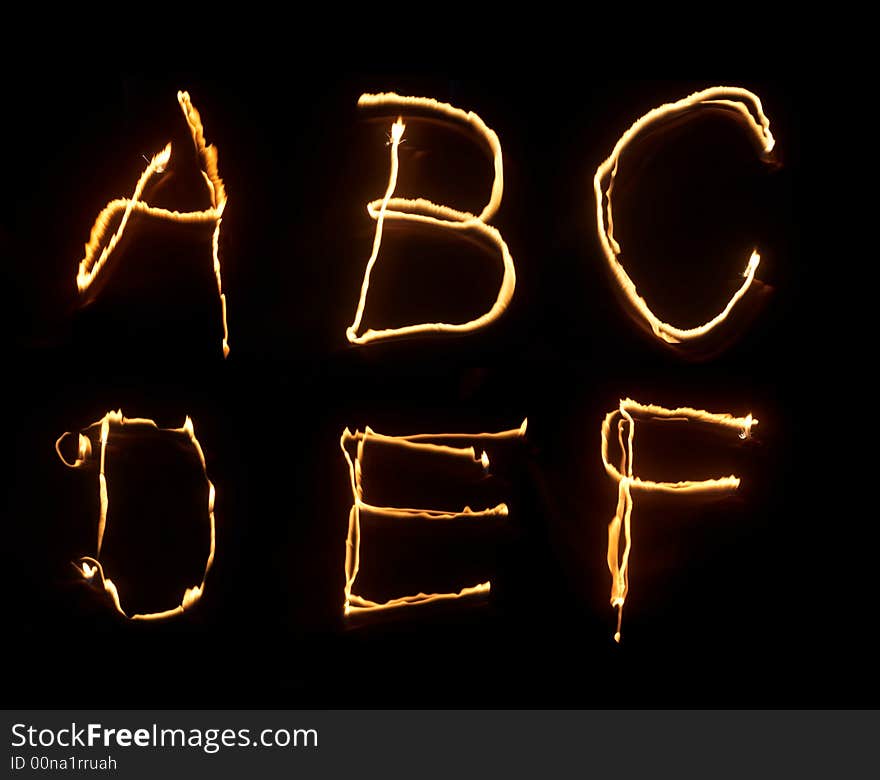 An image of letters on black background. An image of letters on black background