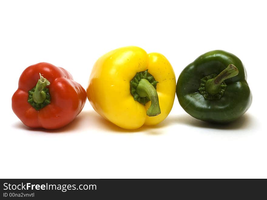 Three peppers on the white background