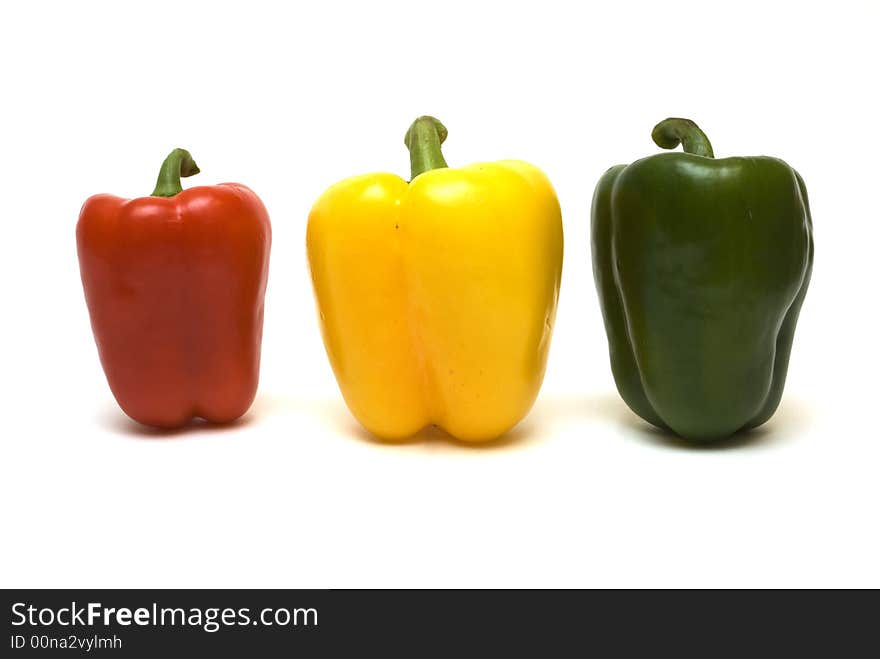 Three peppers on the white background