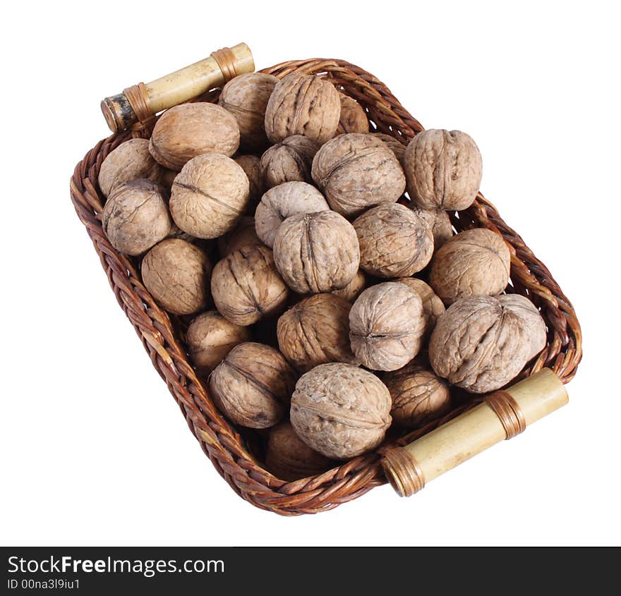 Nuts in a wooden small basket