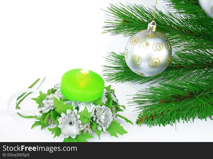 Christmas ornaments.Gray ball,fir-tree,candle,silvery flowers.