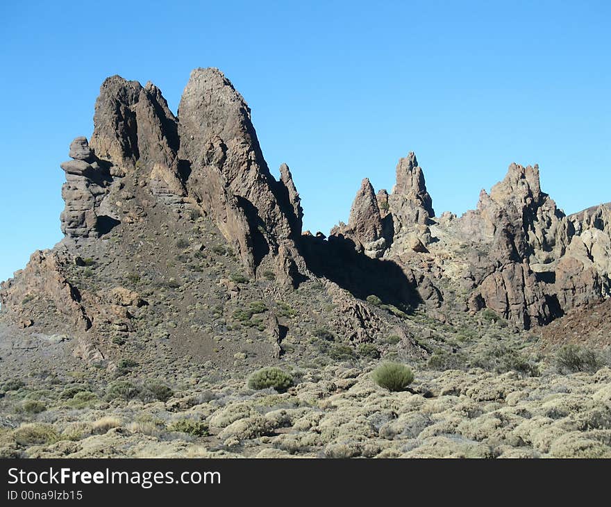 The Roques de Garcia mountains and the Teide volcano as a background (Las Canadas national park, Tenerife).