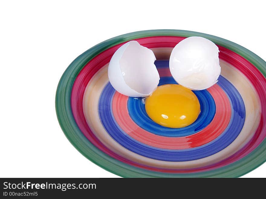 Broken egg on fun plate. Broken egg on fun plate.